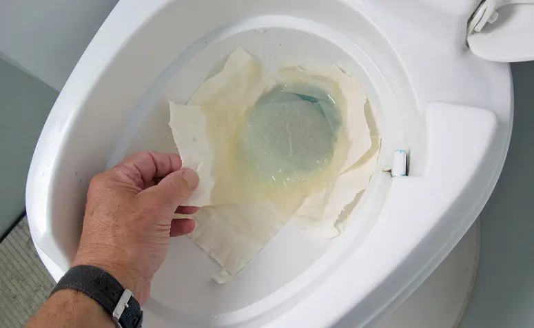 Taking Paper From Toilet