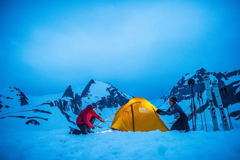 Couple Setting Up A Tent