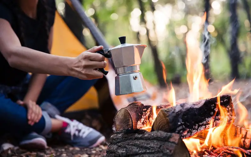 Moka pot coffee brew on a campfire