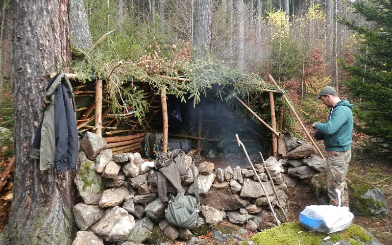 Building shelter for survival campsite